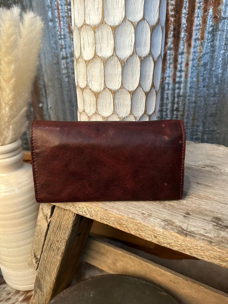 Dark tooled leather wallet