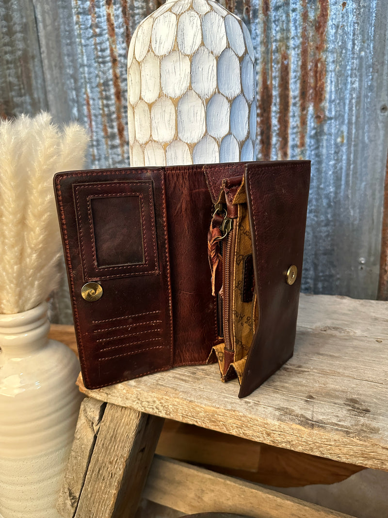 Dark tooled leather wallet